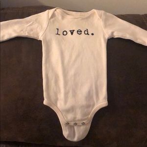 “loved.” baby girl onesie